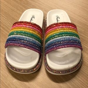 Never worn thick soled sandals, runs slightly big